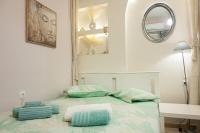 Posteľ alebo postele v izbe v ubytovaní SERENITY yard apartment