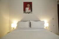 Postel nebo postele na pokoji v ubytování Aθens Dome - Apartments by Live&Travel