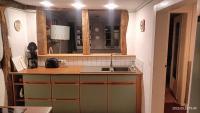 Kuchyň nebo kuchyňský kout v ubytování Haus Petersilie