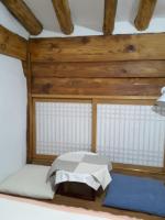 Ein Bett oder Betten in einem Zimmer der Unterkunft Yettle Hanok Stay