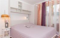 Posteľ alebo postele v izbe v ubytovaní Apartment Augusta Senoe Vi