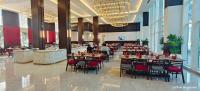 Restaurace v ubytování Ramada by Wyndham Ahmedabad Narendra Modi Stadium Motera