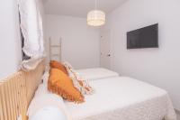 Posteľ alebo postele v izbe v ubytovaní Villa Eden Beachfront Corralejo By Holidays Home