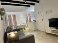 TV a/nebo společenská místnost v ubytování Loft Time Somhome Peñíscola