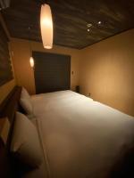 Seven Residence Musicにあるベッド