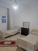 Postel nebo postele na pokoji v ubytování Résidence SUN SHINE DJERBA