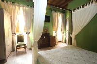 Postel nebo postele na pokoji v ubytování Posada Villa Maria