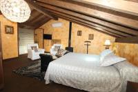 Postel nebo postele na pokoji v ubytování Posada Villa Maria
