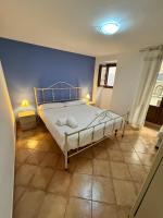 Posteľ alebo postele v izbe v ubytovaní Casa Gioeni