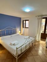 Posteľ alebo postele v izbe v ubytovaní Casa Gioeni