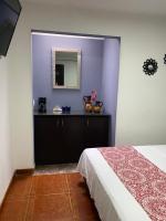 Hotel Boutique Casa Magalyにあるベッド