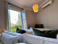 Postel nebo postele na pokoji v ubytování Plaza Sagrada Familia apartment
