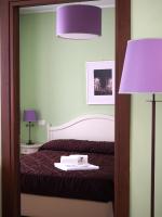 Łóżko lub łóżka w pokoju w obiekcie Santa Giulia Hotel e Residence Torino
