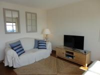 Televízia a/alebo spoločenská miestnosť v ubytovaní Apartamento Consolat de Mar Cambrils