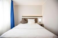 Postel nebo postele na pokoji v ubytování Best Western Plus Theodor Storm Hotel