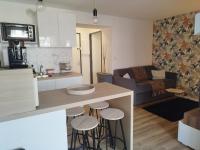 Kuchnia lub aneks kuchenny w obiekcie Les Palmiers Appartement 4 personnes 50m De La Plage Parking