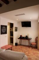 AH Art Hotel Palmaにあるテレビまたはエンターテインメントセンター