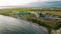 an aerial view of a resort on the beach at Hilton Ponce Golf & Casino Resort in Ponce
