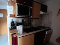 Kuchyňa alebo kuchynka v ubytovaní Chalet Du Bois De Suffin N 10 - Appartement cosy à 20m des pistes ! Plein sud - 4 pers. Terrasse - parking couvert MAE-8844