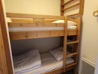 Posteľ alebo postele v izbe v ubytovaní Chalet Du Bois De Suffin N 10 - Appartement cosy à 20m des pistes ! Plein sud - 4 pers. Terrasse - parking couvert MAE-8844