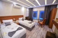swiss hotel downtownにあるベッド
