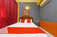OYO 89656 Melati Hotel Nilaiにあるベッド