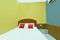 OYO 89656 Melati Hotel Nilaiにあるベッド