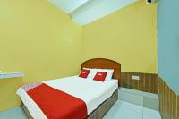 OYO 89656 Melati Hotel Nilaiにあるベッド