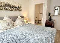 Posteľ alebo postele v izbe v ubytovaní BELLE KITZ PURE im Zentrum by Belle Stay