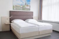 Postel nebo postele na pokoji v ubytování Viva Hotel Lübeck