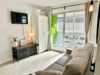 A television and/or entertainment centre at FUENGIROLA Los Boliches MALAGA - GREEN LOVE