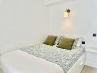 A bed or beds in a room at FUENGIROLA Los Boliches MALAGA - GREEN LOVE