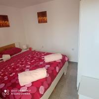 Postel nebo postele na pokoji v ubytování Apartments Max