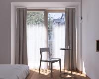 Łóżko lub łóżka w pokoju w obiekcie Hotel Blü Gastein