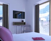 Telewizja i/lub zestaw kina domowego w obiekcie Hotel Blü Gastein