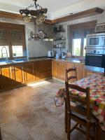 Kuchyň nebo kuchyňský kout v ubytování Chalet ENTERO CONFORT