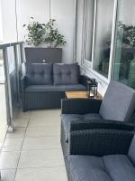 A seating area at Comfy condo on the 20th floor & FREE parking