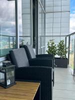 A seating area at Comfy condo on the 20th floor & FREE parking