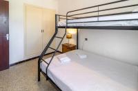 Posteľ alebo postele v izbe v ubytovaní Sant Genís 19 ático con terraza y vistas