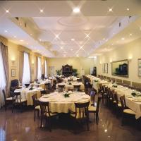 a large banquet hall with tables and chairs in it at Albergo Ristorante Bigiù in Sant'Omobono Terme