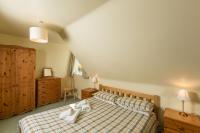 Postel nebo postele na pokoji v ubytování Le Douit Farm Self Catering