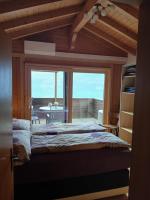 Postel nebo postele na pokoji v ubytování Chalet Diana Lakefront