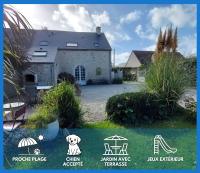 una casa con un cartel delante en Le So Sweet, maison avec jardin clos, terrasse aménagé, jeux et jouets, baby foot, flipper, table de ping pong, à 1km de la plage d&#39; Omaha beach et près Port en Bessin, en Sainte-Honorine-des-Pertes