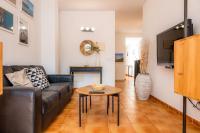 Televízia a/alebo spoločenská miestnosť v ubytovaní Apartamento Can Jaume