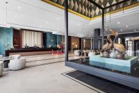 a lobby of a hotel with a reception area at Hotel Riu Palace Tikida Agadir - All Inclusive in Agadir