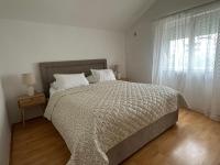 Posteľ alebo postele v izbe v ubytovaní Apartments Charming