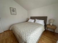 Posteľ alebo postele v izbe v ubytovaní Apartments Charming