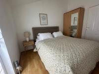 Posteľ alebo postele v izbe v ubytovaní Apartments Charming