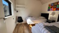 Esehytter Luxury Holiday Home near Beachにあるベッド