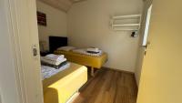 Esehytter Luxury Holiday Home near Beachにあるベッド